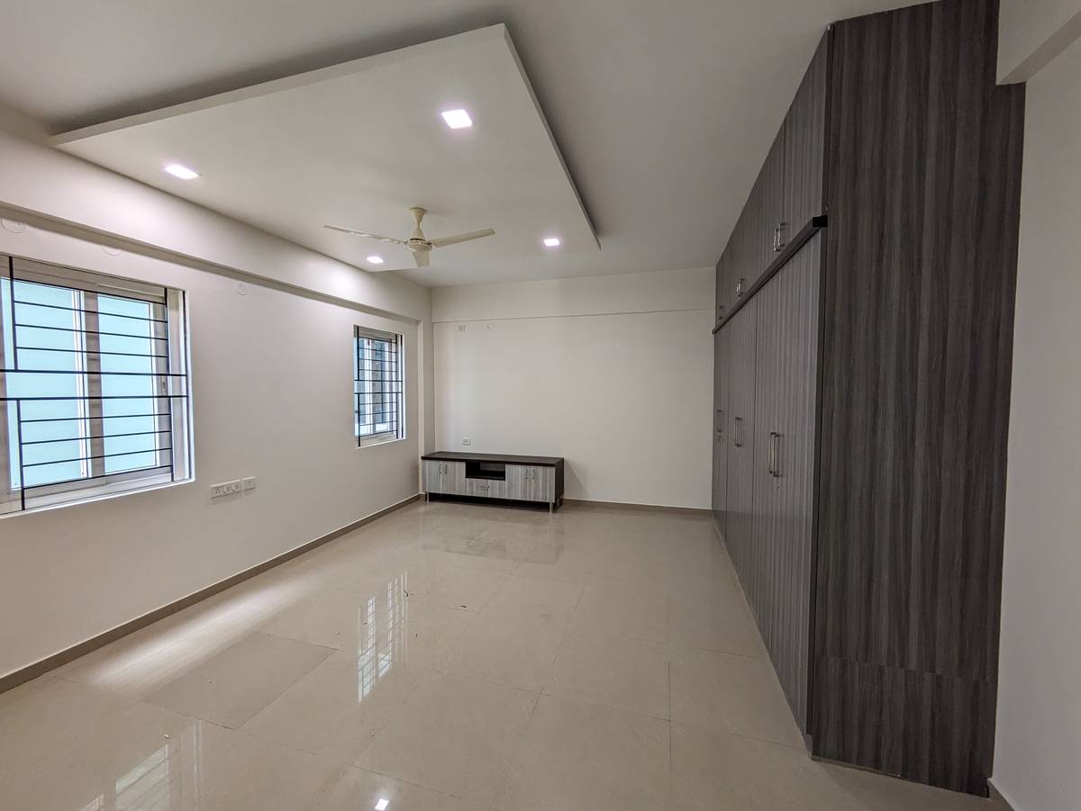 Master bedroom with balcony access